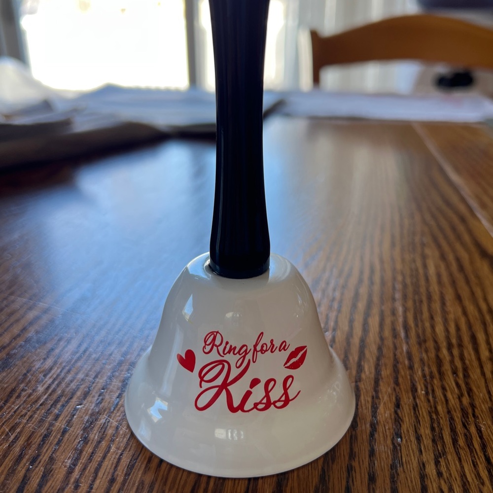 “Ring for a Kiss” Decorative Hand Bell - White with Red Script